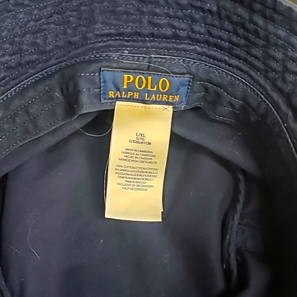Navy blue polo bucket hat with green horse. Like new 9/10